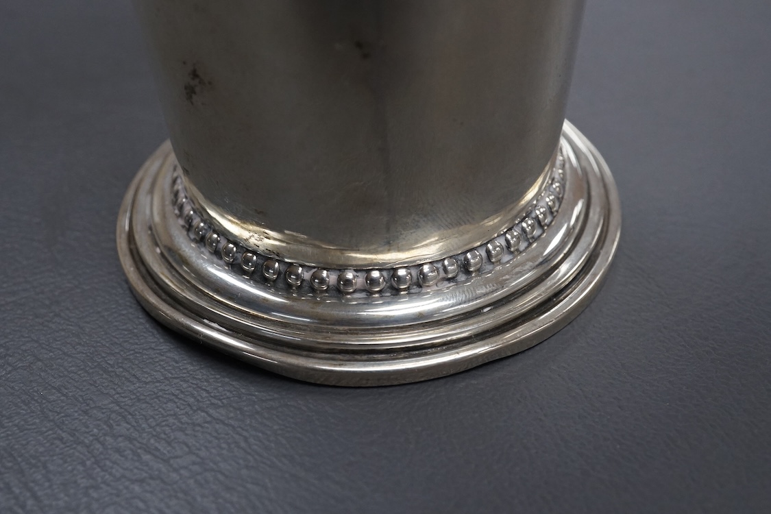 A Georg Jensen sterling 925 beaker, with flared rim and engraved inscription 'The Bookies Cup, 1933' design no.107A, 1925-1932 mark, import marks for George Stockwell, London, 1931, height 13.5cm, 174 grams (a,f,).